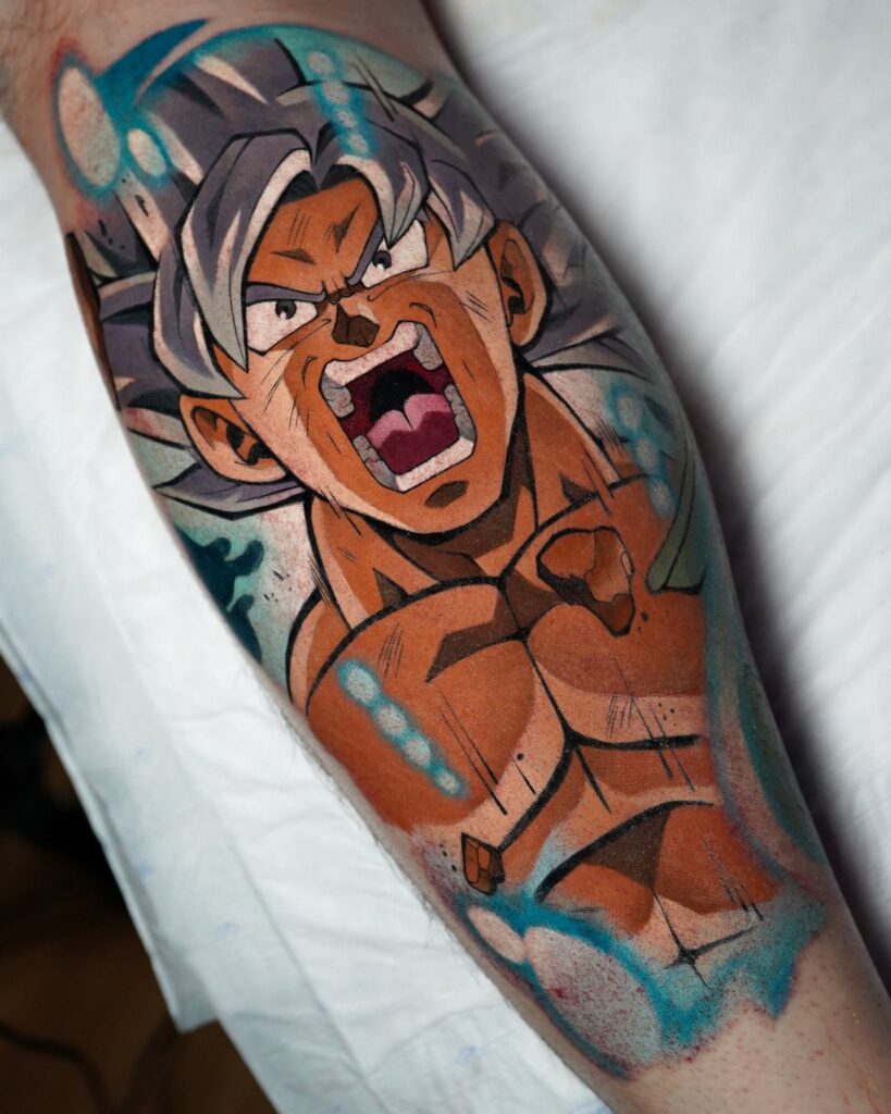 Goku tattoo on an arm with grey hair and blue energy aura effects